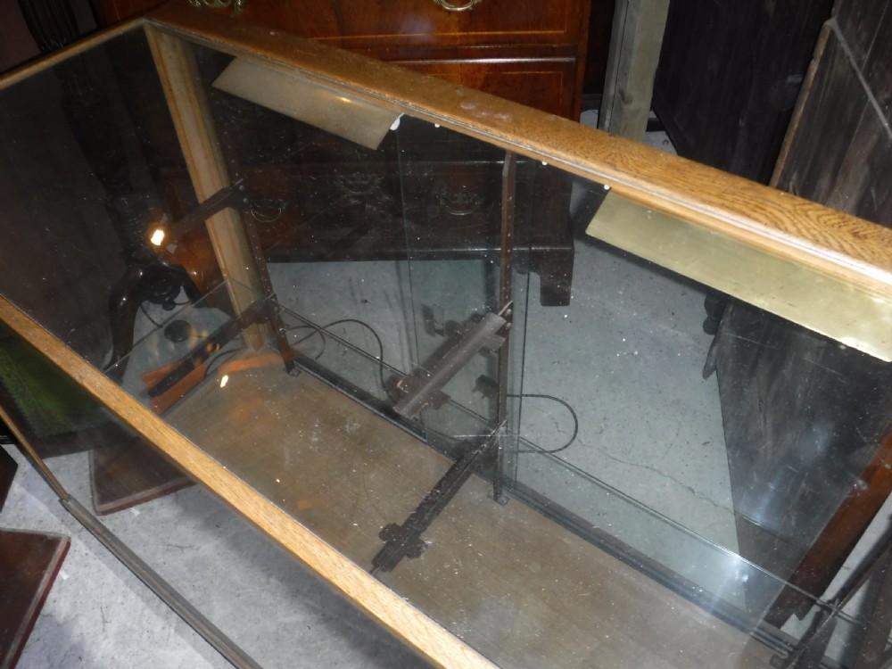 Early 20th century oak shop display cabinet View IV