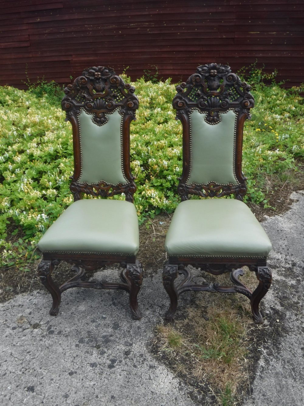 Good pair of 19th century carved oak hall chairs