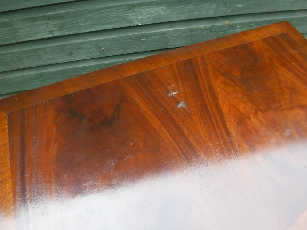 Small early 20th century serpentine front mahogany chest View VI