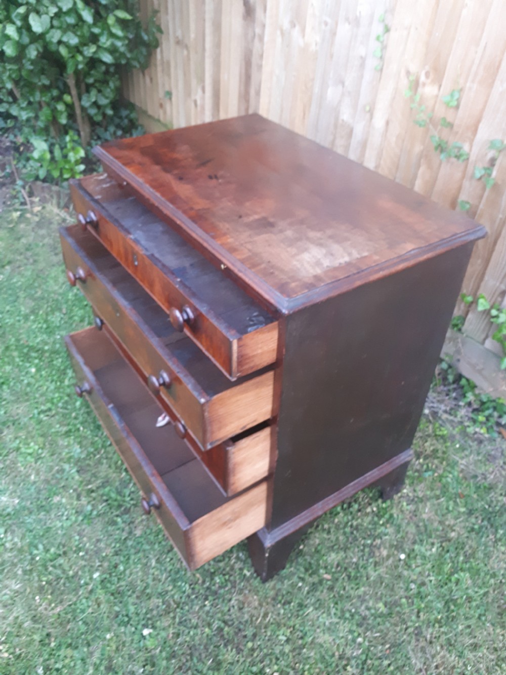 Small Georgian mahogany chest with slide View IV