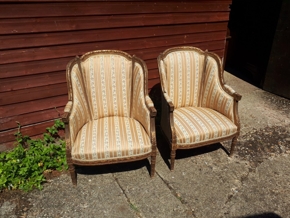 Pair of gilt carved framed armchairs View II