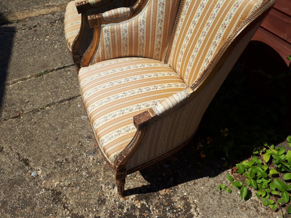 Pair of gilt carved framed armchairs View V