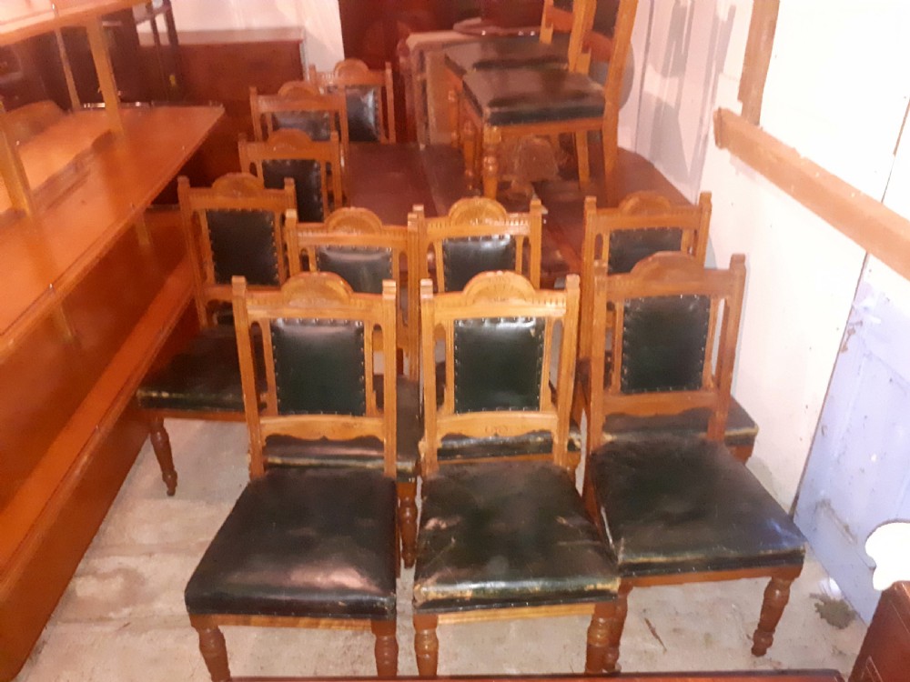 Set of 12 oak dining chairs View II