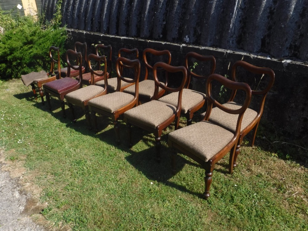 Set of 12 early Victorian mahogany dining chairs View II