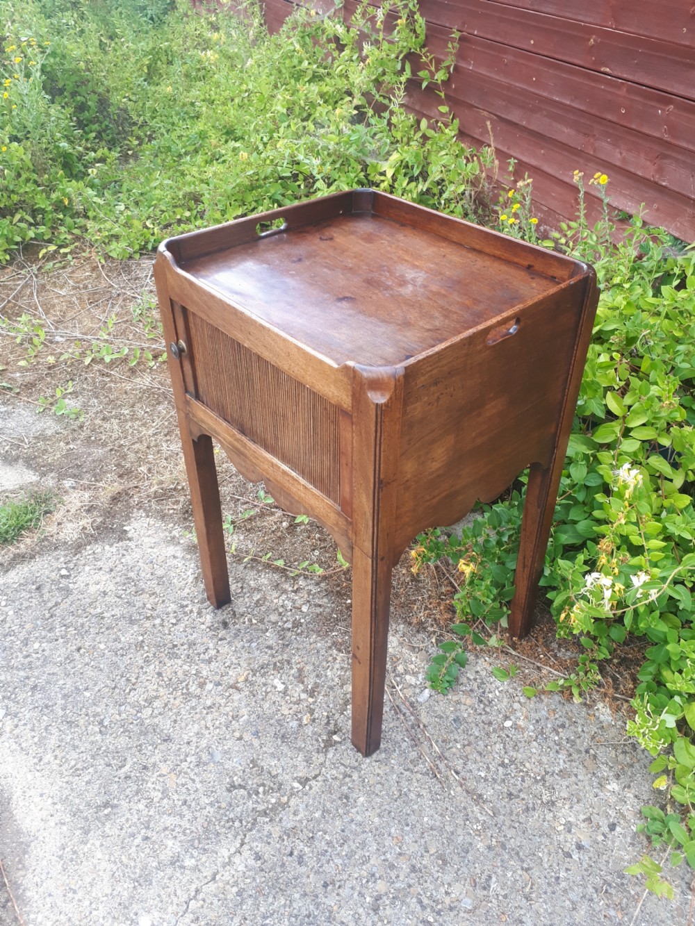 Late Georgian mahogany tambour front cabinet View II