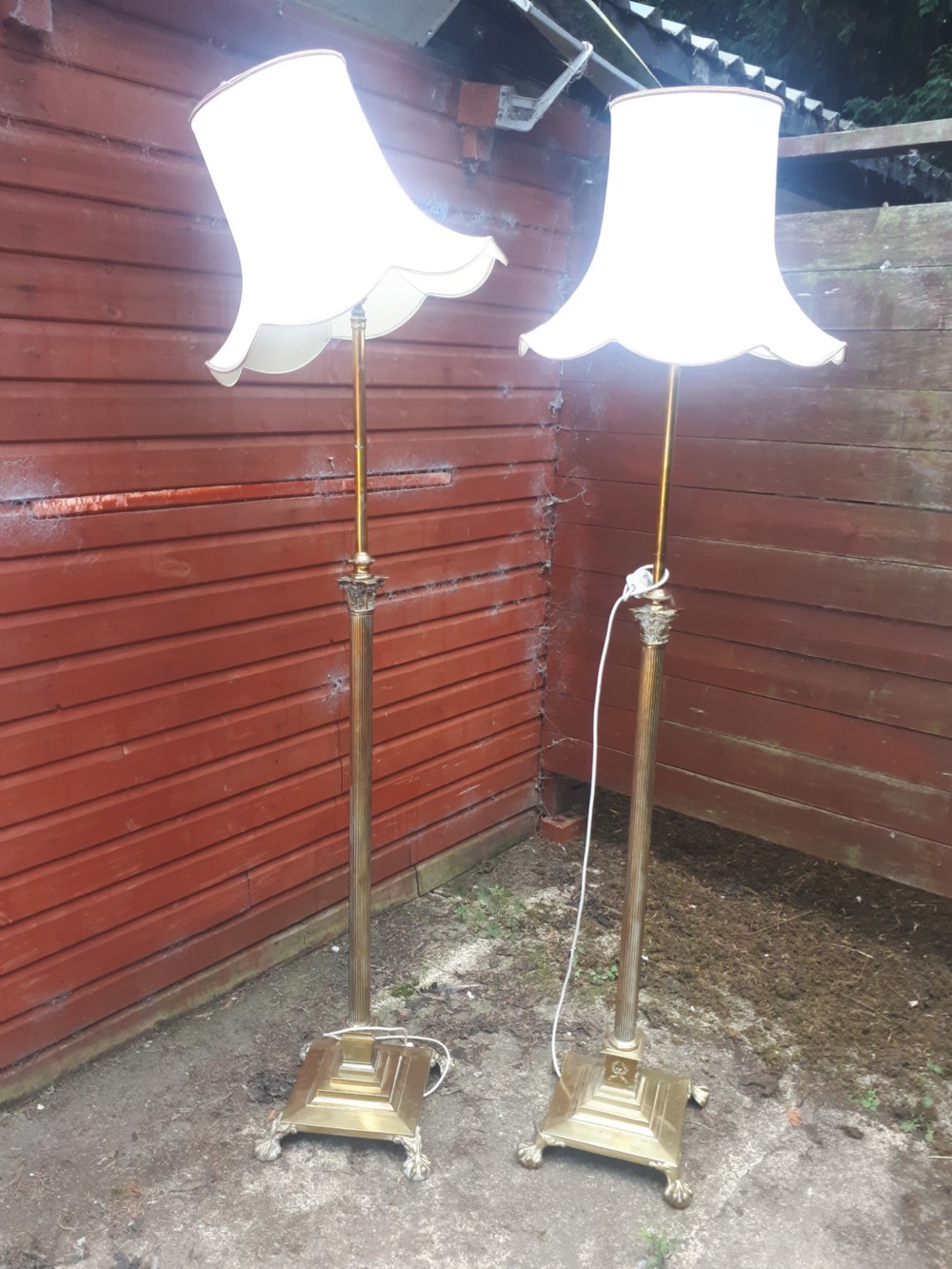 Matched pair of brass lamp standards