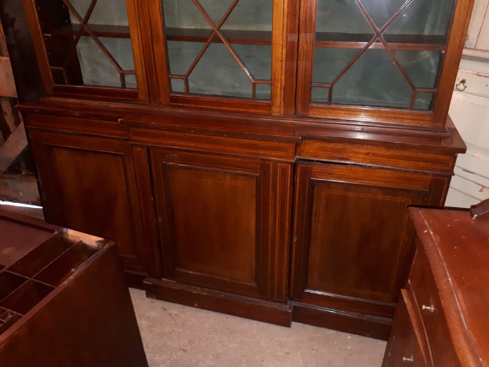 Edwardian inlaid mahogany breakfront bookcase.  View IV