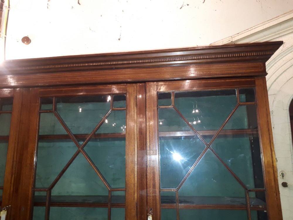 Edwardian inlaid mahogany breakfront bookcase.  View V