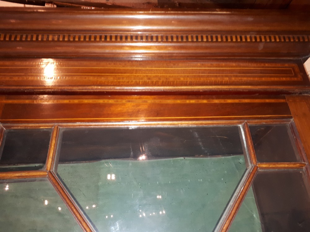 Edwardian inlaid mahogany breakfront bookcase.  View VI