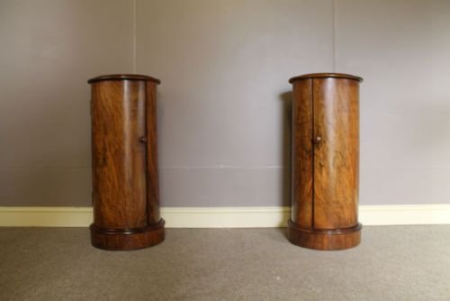 A Pair of Walnut Cylindrical Bedside Cupboards