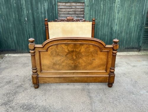 a 19th century walnut bed