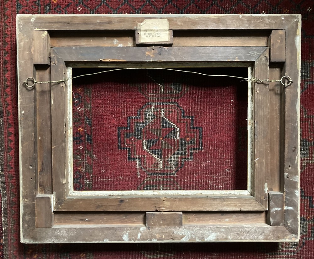 A matching pair of rectangular antique gilt gesso picture frames featuring ornate corner carvings and leaf motif mouldings. View XIII