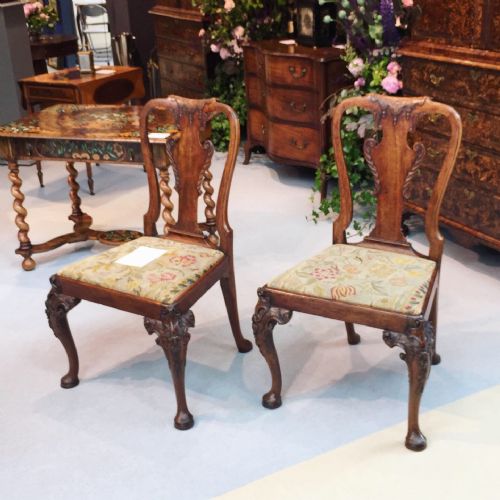 a pair of george i carved walnut chairs possibly irish - CATEGORY: ANTIQUE CHAIRS - DATED 18TH CENTURY