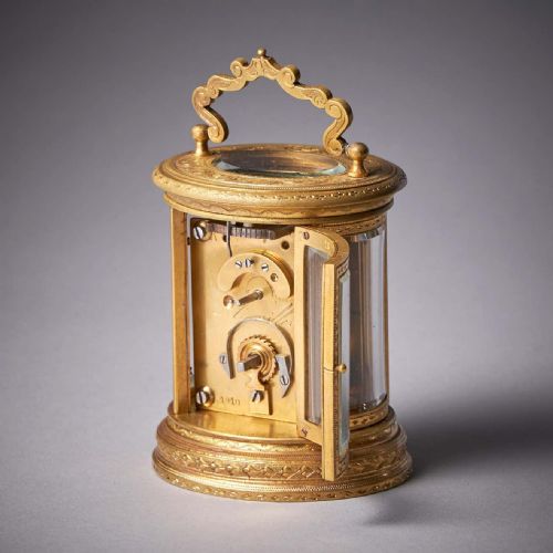 19TH CENTURY EIGHTDAY MINIATURE GILTBRASS CARRIAGE CLOCK WITH ORIGINAL CASE - ADDITIONAL PHOTO 5