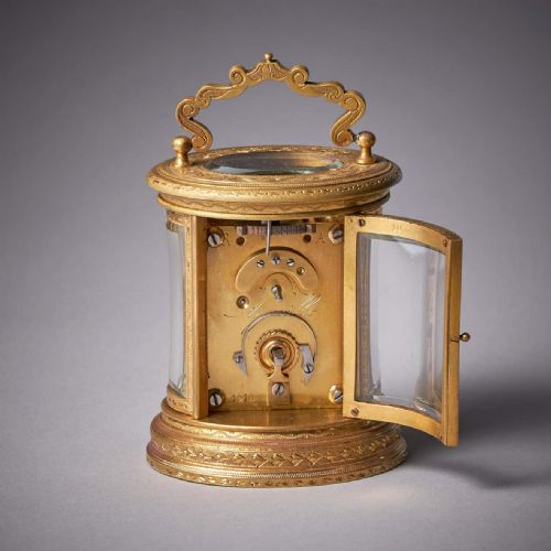 19TH CENTURY EIGHTDAY MINIATURE GILTBRASS CARRIAGE CLOCK WITH ORIGINAL CASE - ADDITIONAL PHOTO 6