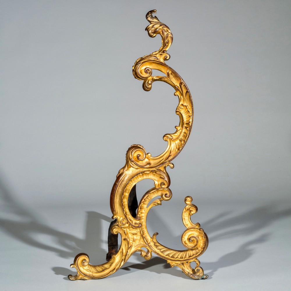 A pair of 18th-century gilt bronze Rococo andirons featuring swept C-scrolls, acanthus leaf carving, and iron rear billet bars. View III