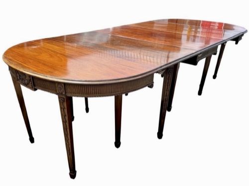 LATE GEORGE III MAHOGANY DEND EXTENDING DINING TABLE MANNER OF ROBERT ADAM