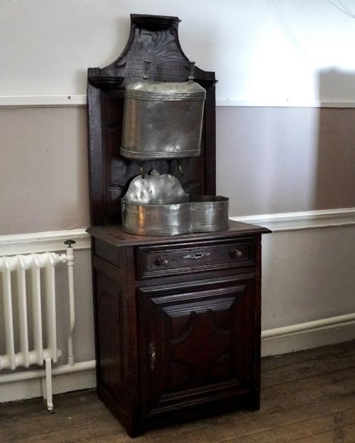 18TH CENTURY FRENCH PROVINCIAL CHESTNUT LAVABO CABINET WITH ORIGINAL PEWTER CISTERN BASIN