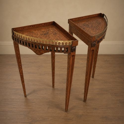 fig 7. A pair of 18th-century triangular corner tables featuring detailed floral marquetry top surfaces, pierced friezes, tapering legs, and brass galleries.