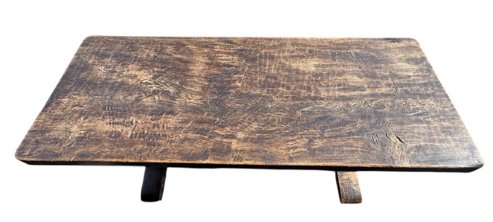 A 17th-century oak and elm refectory dining table featuring a solid single-plank top over thick carved bulbous pedestal supports and a low central stretcher rail. View III