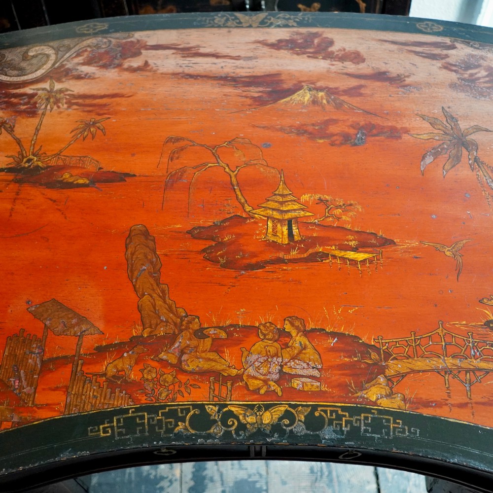 A late nineteenth-century kidney-shaped red lacquered Chinoiserie dressing table featuring four drawers, hand-painted oriental scenes, and cabriole legs. View IV