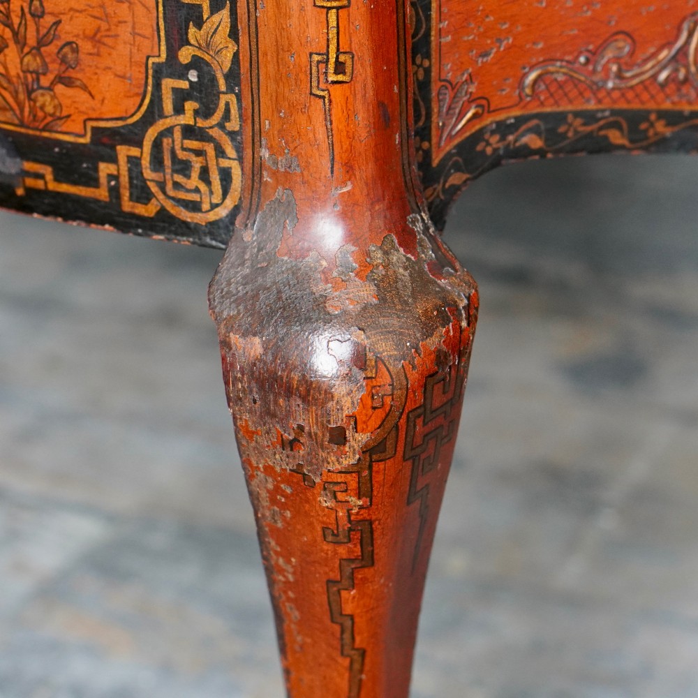 A late nineteenth-century kidney-shaped red lacquered Chinoiserie dressing table featuring four drawers, hand-painted oriental scenes, and cabriole legs. View VI