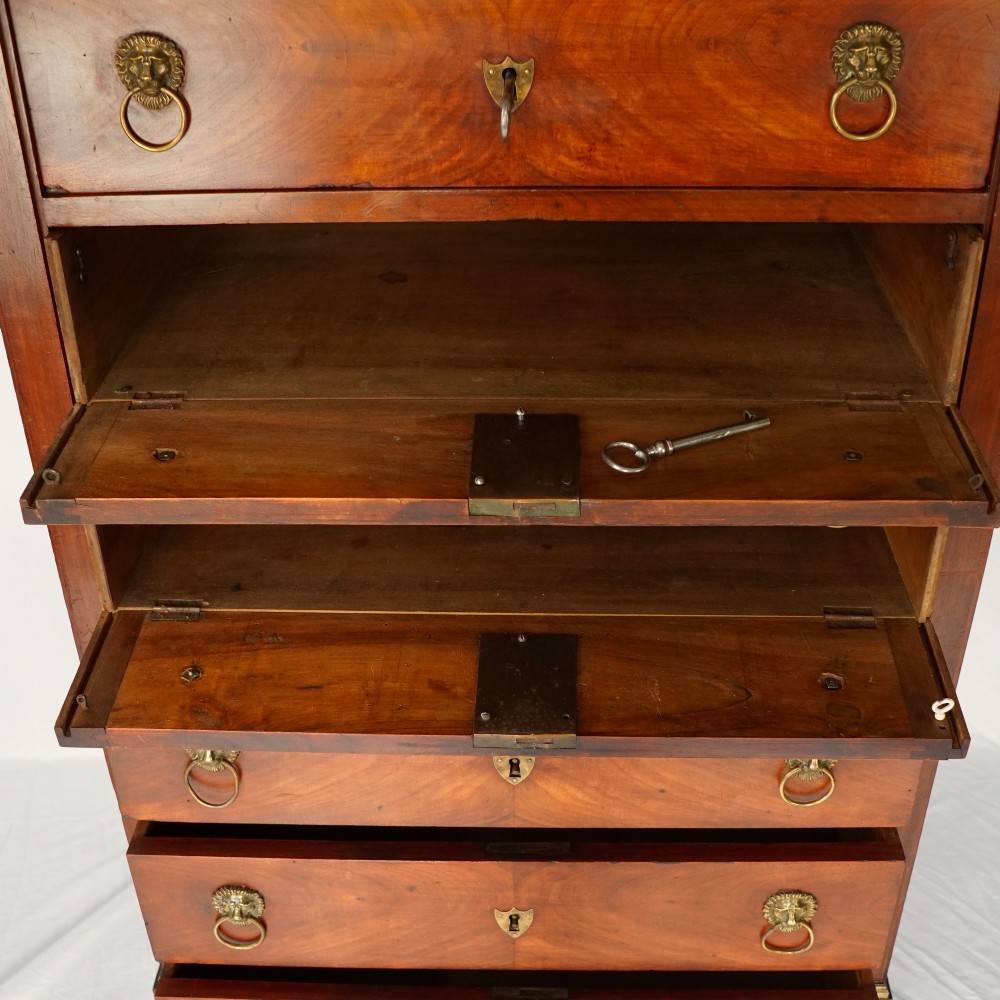 A 19th-century French Empire walnut secretaire cabinet featuring multiple drawers, brass lion-head ring handles, and fall-front writing compartments. View III
