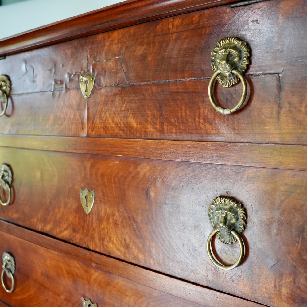A 19th-century French Empire walnut secretaire cabinet featuring multiple drawers, brass lion-head ring handles, and fall-front writing compartments. View XI