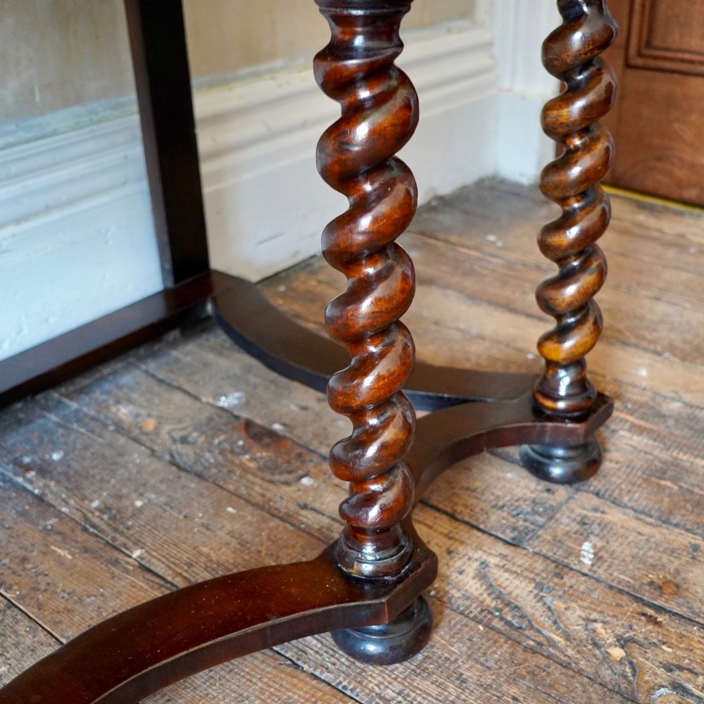 A George I period figured walnut chest on stand featuring engraved brass escutcheons and six barley-twist legs. View XI