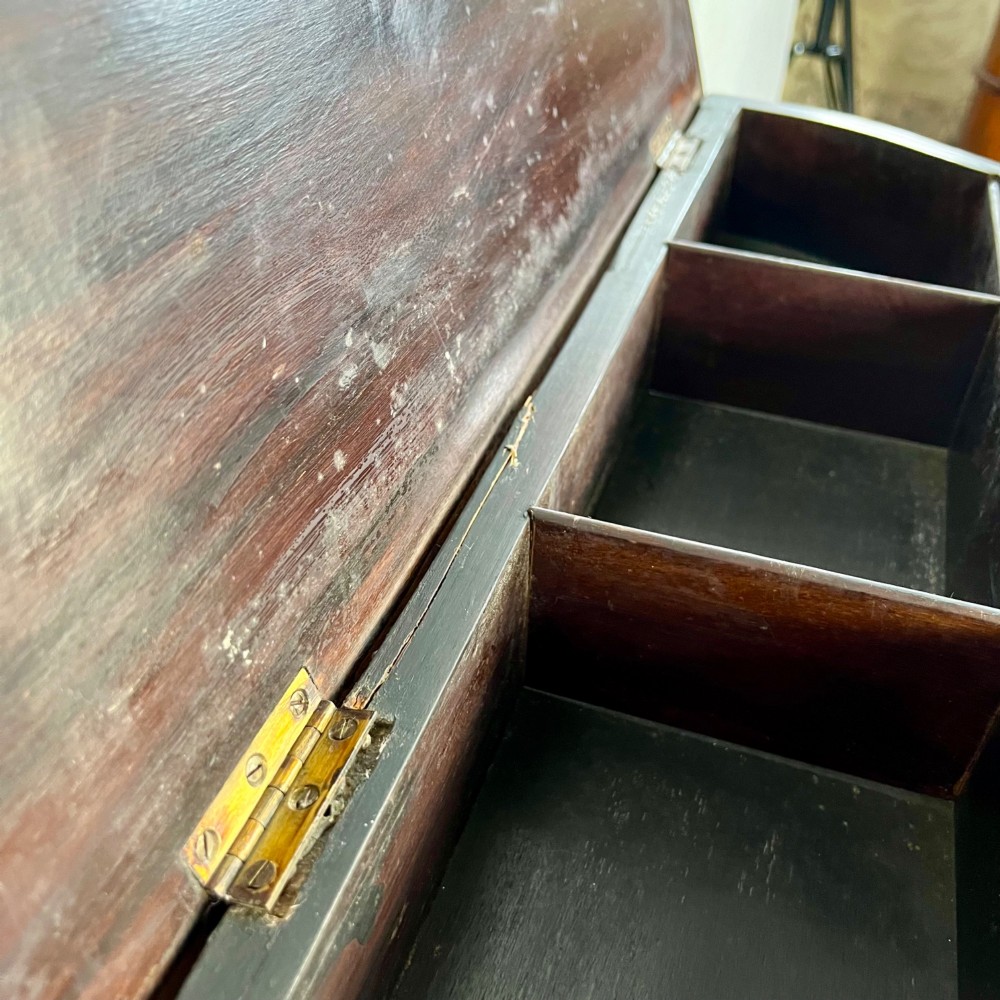A dark mahogany serpentine-front side cabinet with hand-painted floral swags and figurative door panel vignettes resting on slender square tapered legs. View III