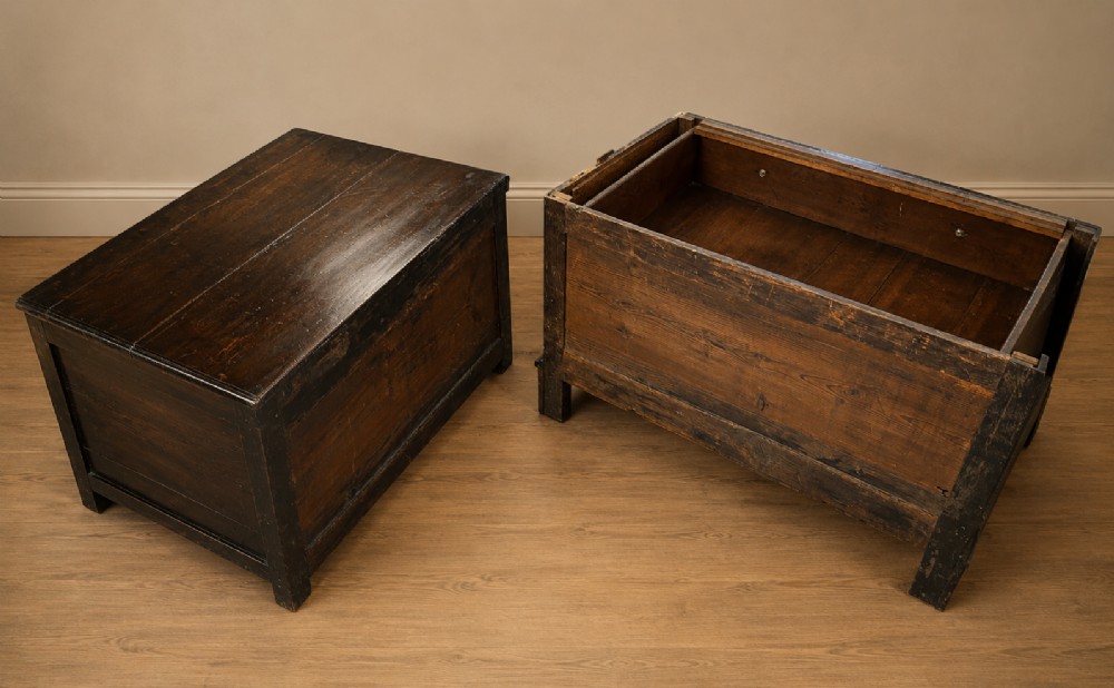 A dark oak Charles II chest of drawers featuring four geometric moulded drawer fronts with brass teardrop handles and decorative brass escutcheons. View XV