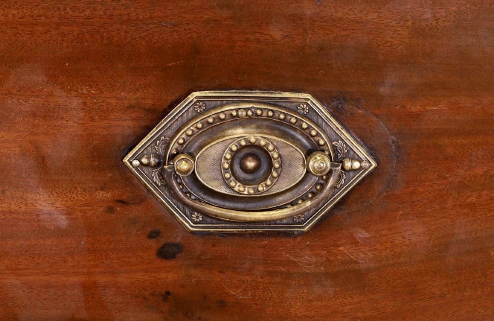 A large George IV mahogany breakfront library bookcase featuring gothic astragal glazed upper doors above drawers and cupboard doors with geometric moulding. View VII