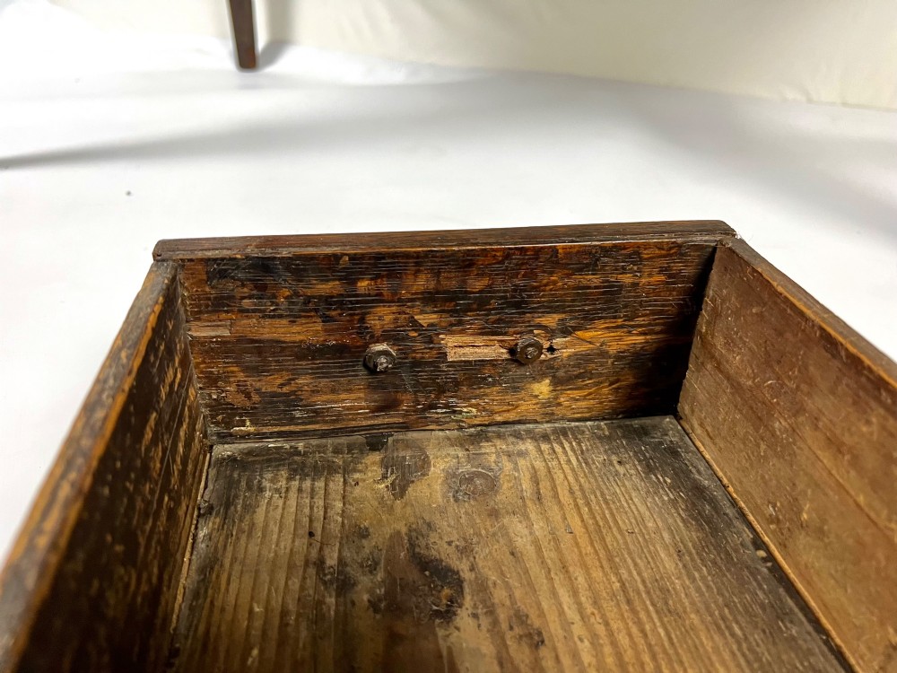 An 18th-century Georgian dark oak lowboy side table featuring three drawers with brass handles, a shaped apron, and slender square legs. View XII