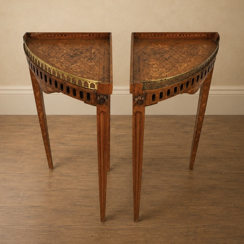 A pair of 18th-century triangular corner tables featuring detailed floral marquetry top surfaces, pierced friezes, tapering legs, and brass galleries. View II