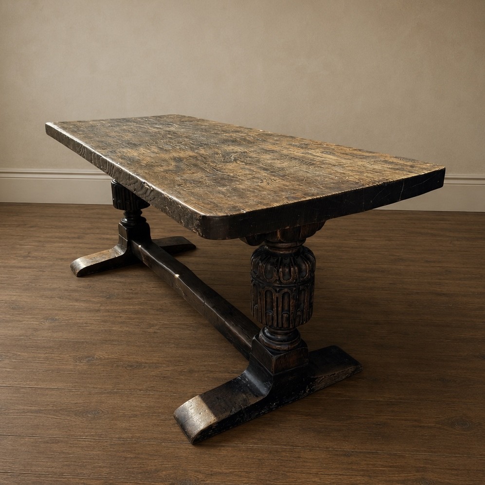 A 17th-century oak and elm refectory dining table featuring a solid single-plank top over thick carved bulbous pedestal supports and a low central stretcher rail. View XIV