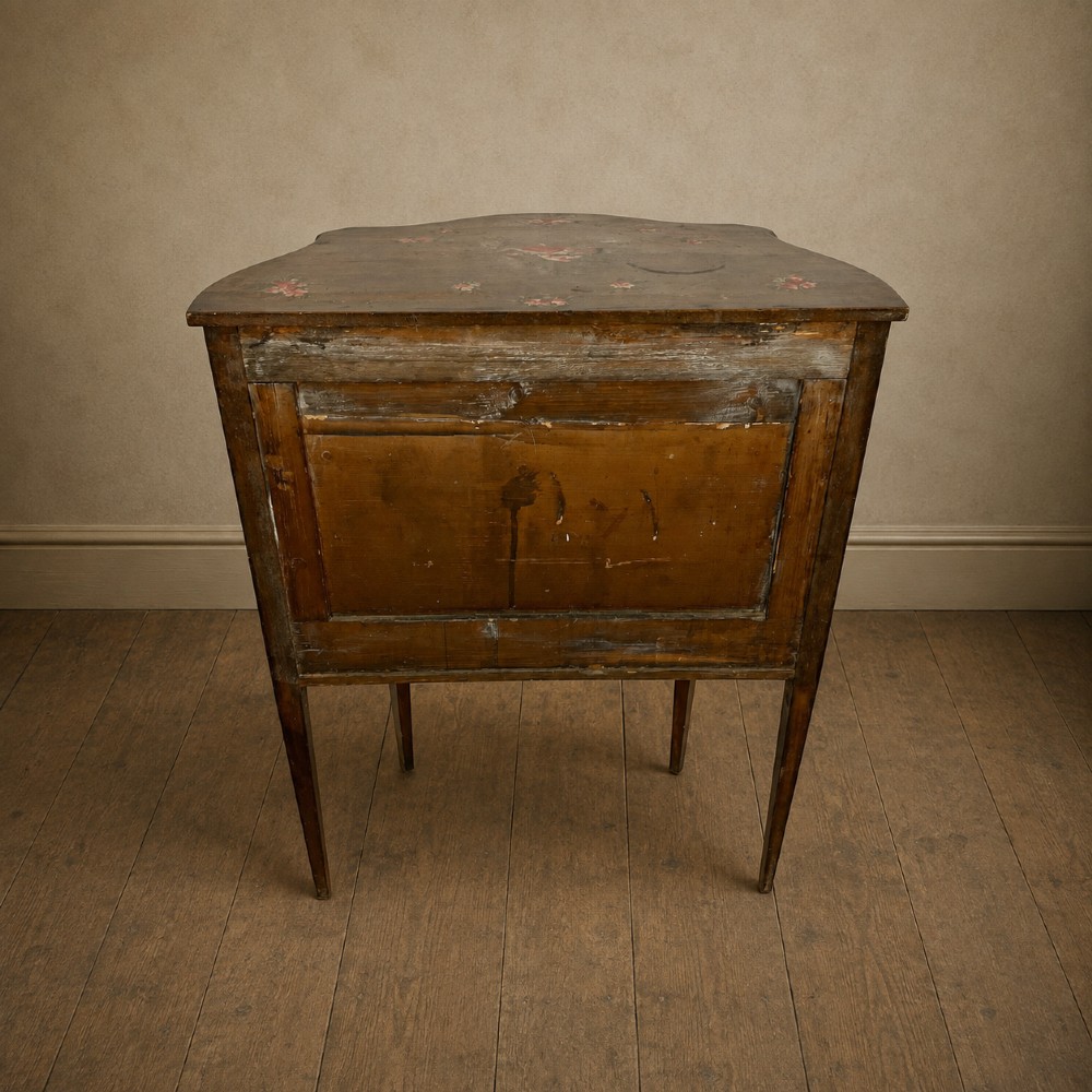 A dark mahogany serpentine-front side cabinet with hand-painted floral swags and figurative door panel vignettes resting on slender square tapered legs. View XII