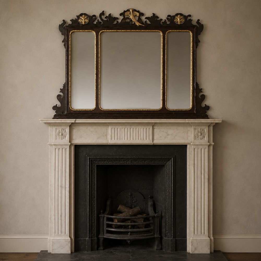 A dark mahogany triptych overmantel mirror with carved pierced fretwork, three mirror panels, and a gilded ho-ho bird cresting. View IX