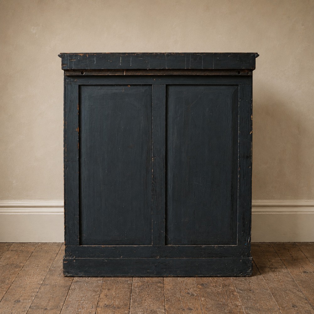 An antique William IV rosewood open bookcase featuring two adjustable shelves, a solid plinth base, and carved scroll capitals atop side pilasters. View XIV