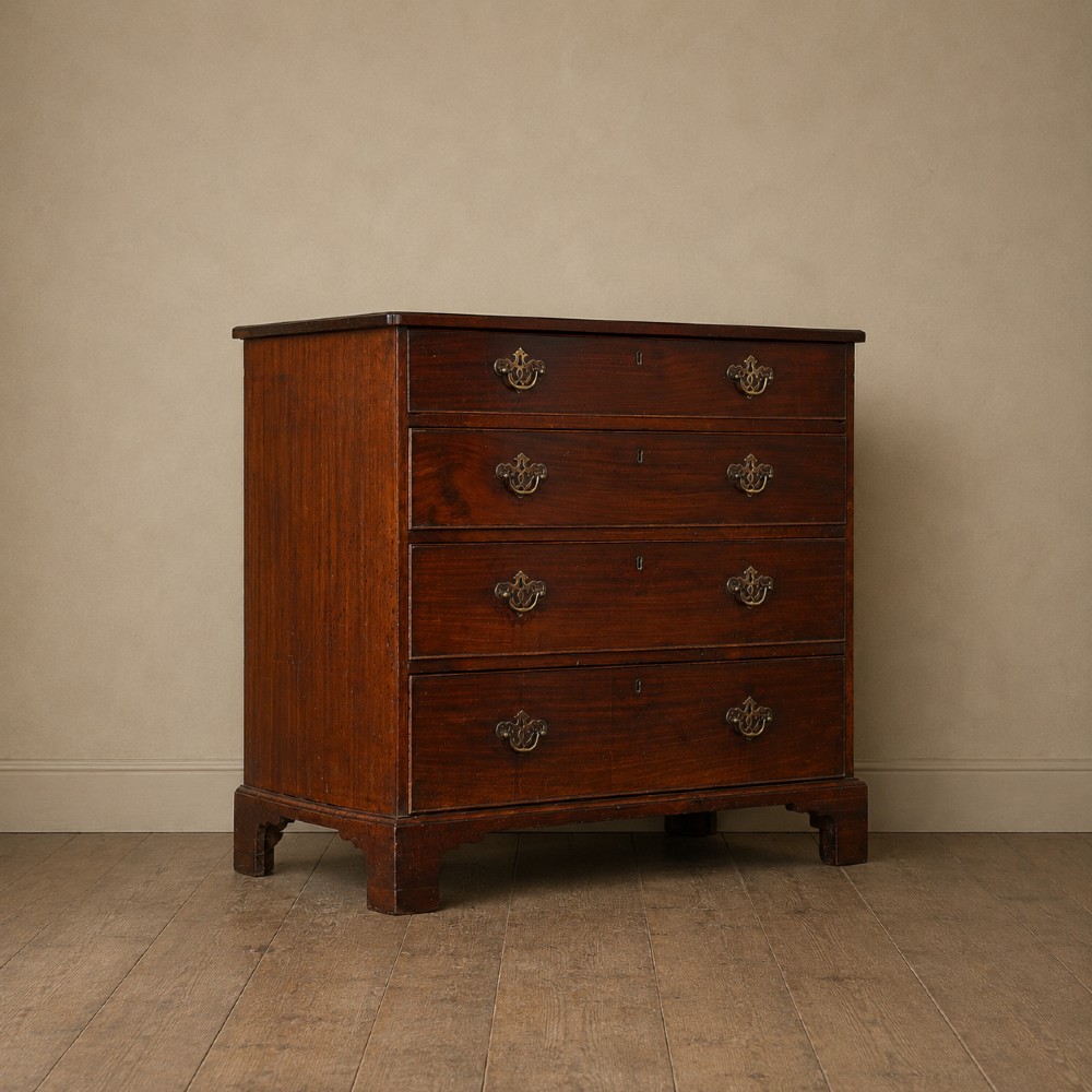 A George II dark mahogany straight-front chest featuring four graduated long drawers with decorative brass swan-neck handles and bracket feet. View II