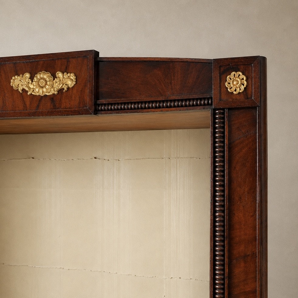 A nineteenth-century French Empire style rosewood open bookcase featuring brass mounts and adjustable shelves above vertical dividers. View VII