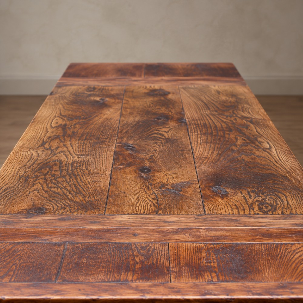 A 17th-century solid oak extending dining table featuring turned legs, lower stretcher rails, and two draw-out end leaves. View XI
