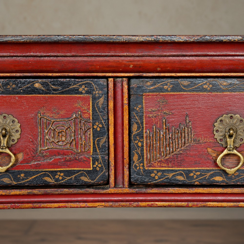 A late nineteenth-century kidney-shaped red lacquered Chinoiserie dressing table featuring four drawers, hand-painted oriental scenes, and cabriole legs. View XIV