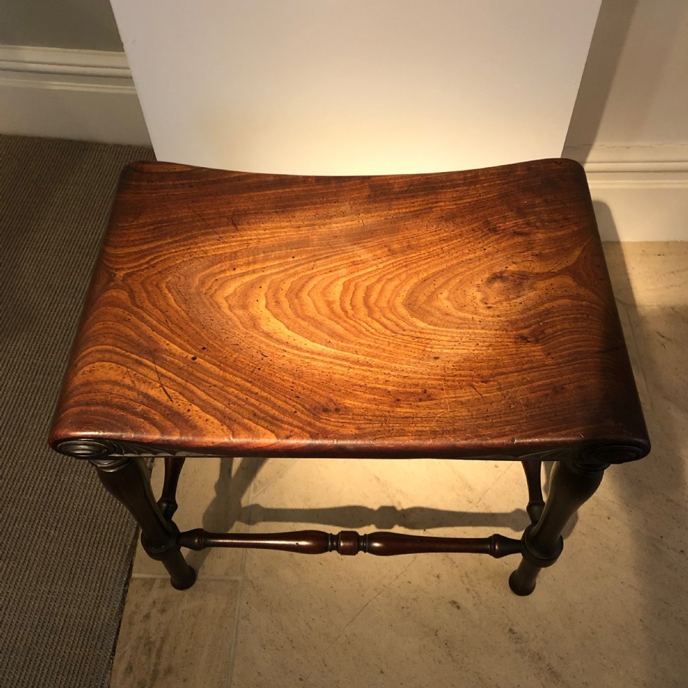 A FINE PAIR OF GEORGE III PERIOD MAHOGANY HALL STOOLS View IV