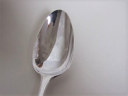 fig 1. A good 18th Century Bright Cut silver serving spoon.