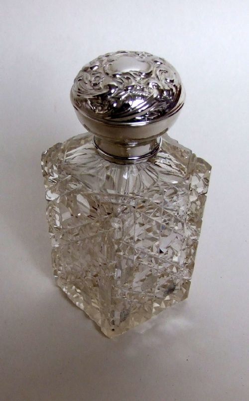 fig 1. A lovely Edwardian silver mounted cologne bottle