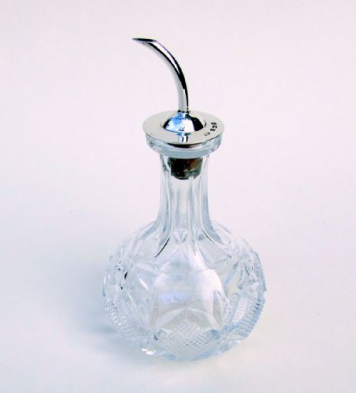 An Unusual Silver Mounted Bitters Jigger.