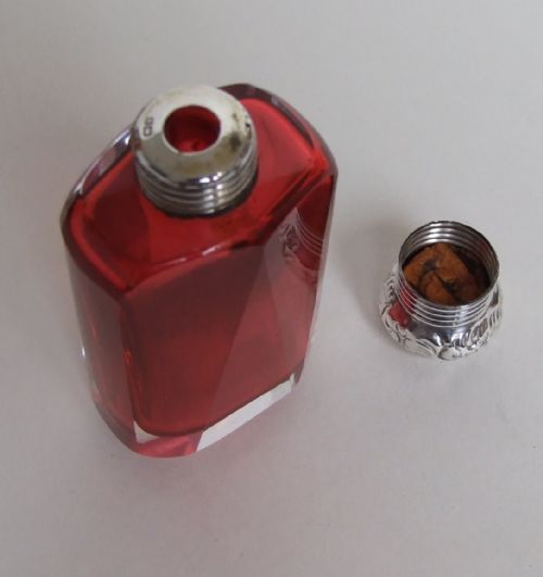 fig 1. A delightful silver mounted cranberry perfume bottle from the late Victorian period.