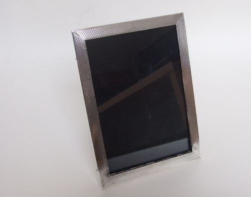 fig 1. Rectangular Art Deco engine turned silver photo frame.
