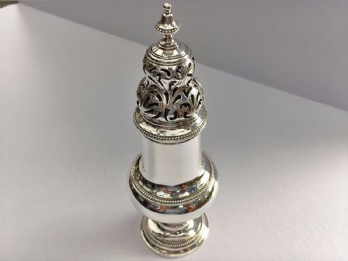 fig 1. Magnificent George III silver sugar caster