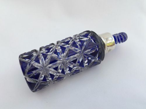fig 1. A splendid silver mounted overlay perfume bottle with original stopper